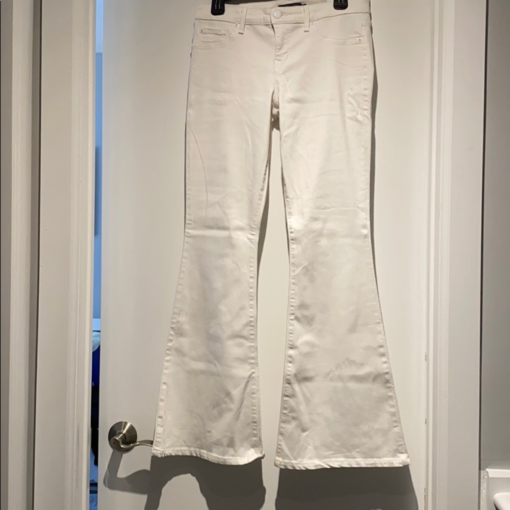 White wide flare jeans